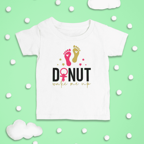 White toddler tee shirt with quote "Donut Makes Me Up"